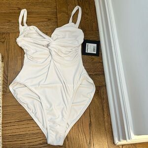 Norma Kamali white one piece twist front bathing suit